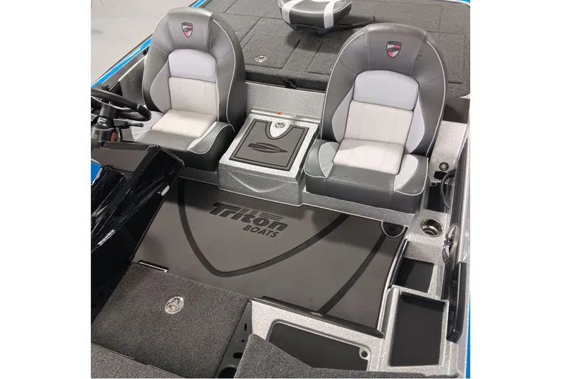 Slide: The Image of 2026 Triton 21XP Patriot boat interior with dual seats and console. - 13