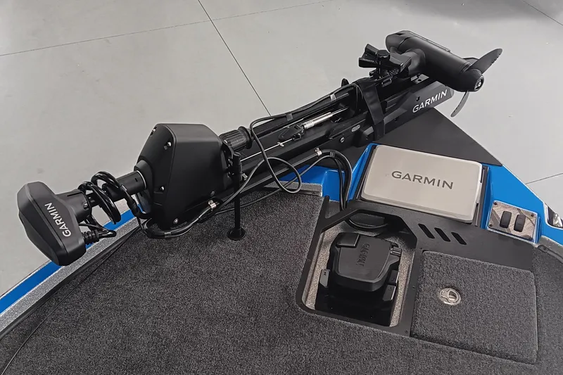 Slide: The Image of 2026 Triton 21XP Patriot boat with Garmin equipment on deck. - 8