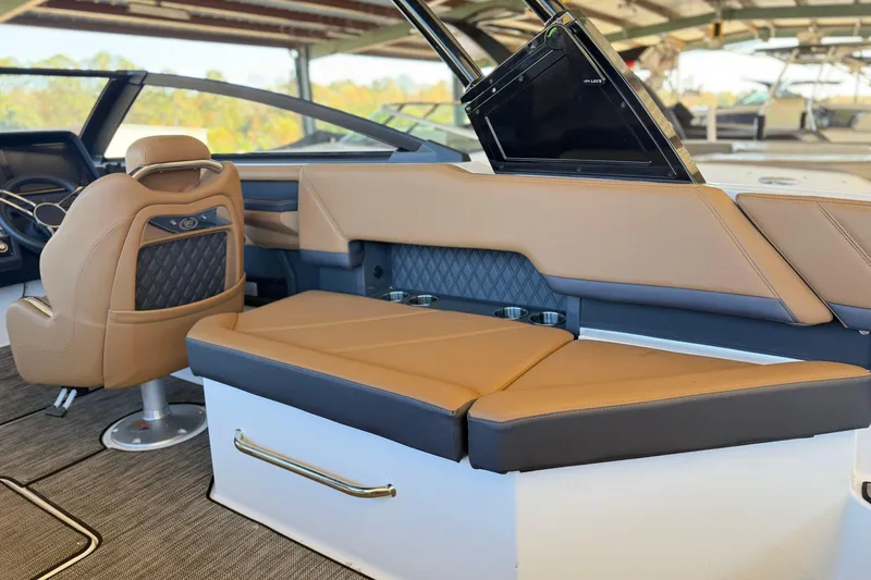 Slide: The Image of Luxurious interior of 2025 Cobalt R8 boat with tan leather seating and modern design. - 11