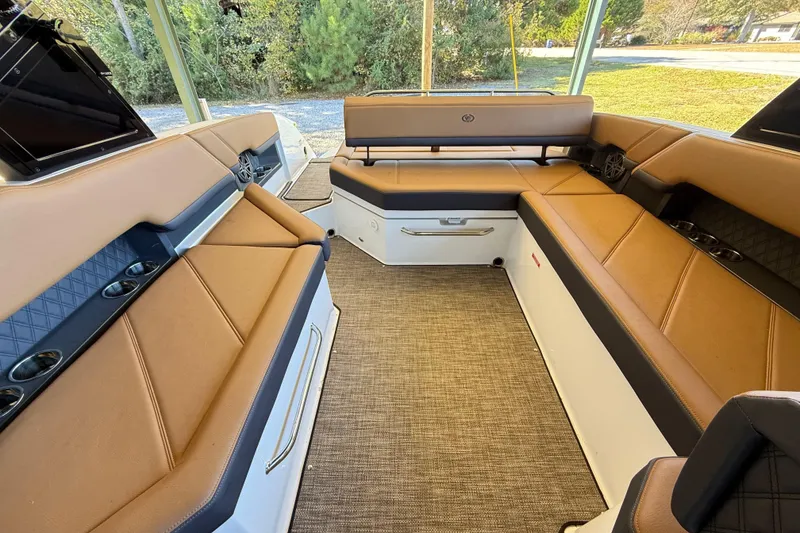 Slide: The Image of Luxurious interior of 2025 Cobalt R8 boat with tan seating and modern design. - 22