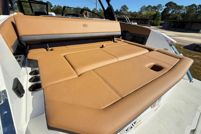 Slide: The Image of 2025 Cobalt R8 boat with tan leather seating and sleek design. - 26