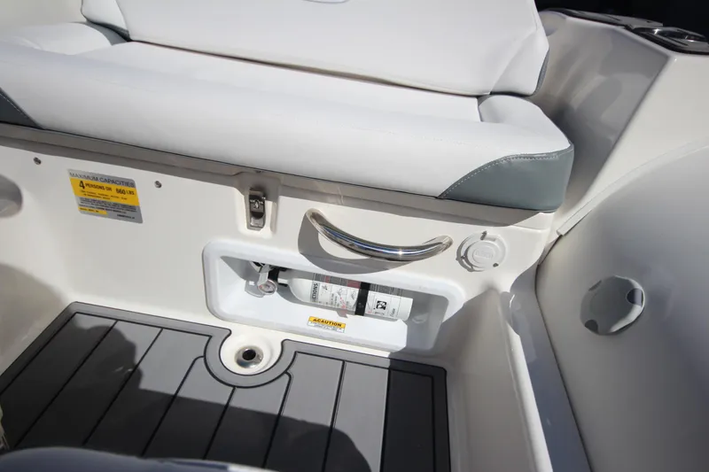 Slide: The Image of 2025 Zodiac Yachtline 360 DL NEO interior with storage compartment and seating. - 12