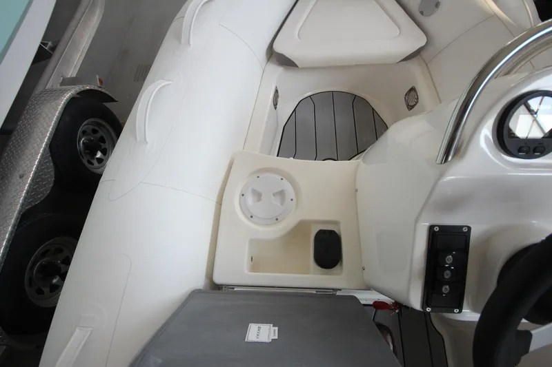 Slide: The Image of Interior view of 2026 Zodiac Yachtline Deluxe 360 boat, featuring sleek design and modern controls. - 14