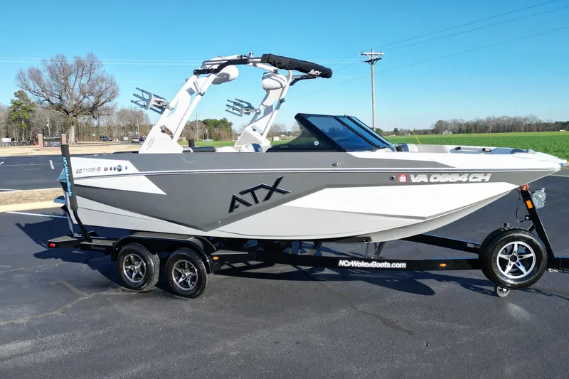 Slide: The Image of 2021 ATX Surf Boats 22 Type-S on trailer, parked outdoors. - 17