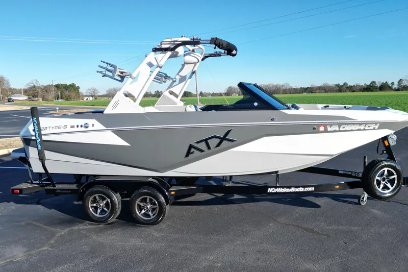 Slide: The Image of 2021 ATX Surf Boats 22 Type-S on trailer, parked outdoors. - 18
