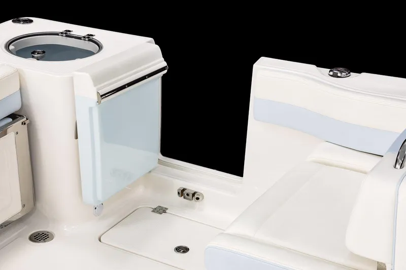 Slide: The Image of 2026 Robalo R257 Dual Console boat interior with sleek seating and modern design. - 6