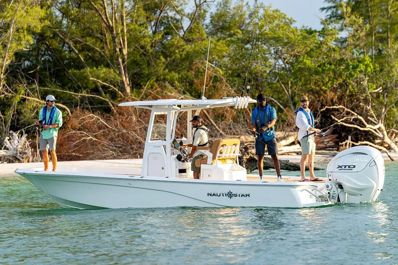 Slide: The Image of Manufacturer Provided Image: 2025 NauticStar 274 Bay boat fishing in coastal waters. - 0