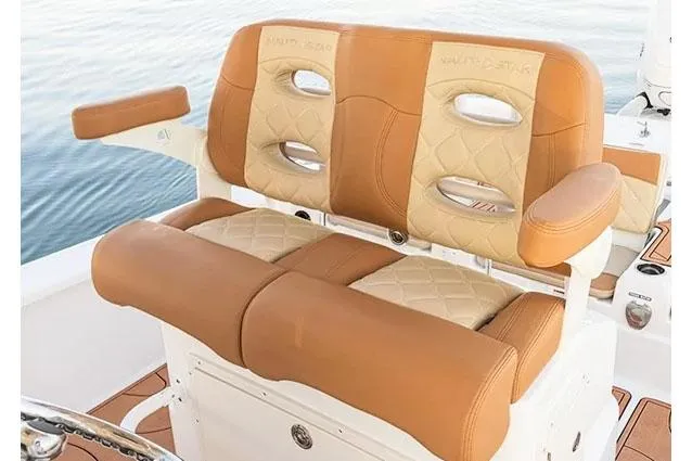 Slide: The Image of Manufacturer Provided Image: NauticStar 274 Bay 2025 boat seat with brown leather. - 6