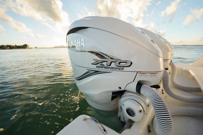 Slide: The Image of Yamaha XTO Offshore engines on a 2020 Tiara Yachts 43 LS, cruising on calm waters. - 18