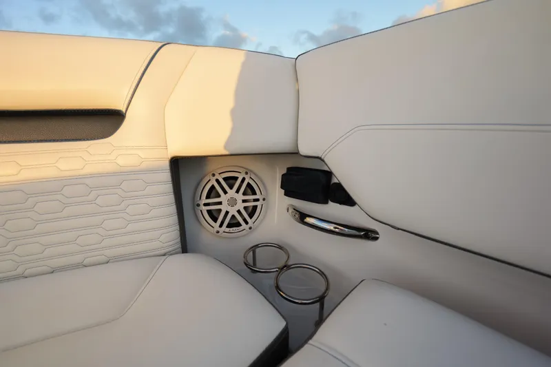 Slide: The Image of Luxury seating area on 2020 Tiara Yachts 43 LS with speaker and cup holders. - 44