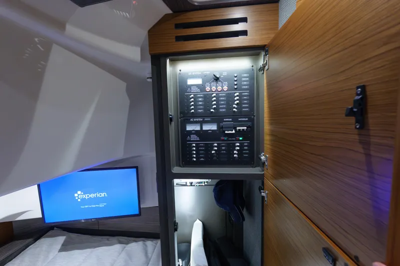 Slide: The Image of 2020 Tiara Yachts 43 LS interior with control panel and screen. - 54