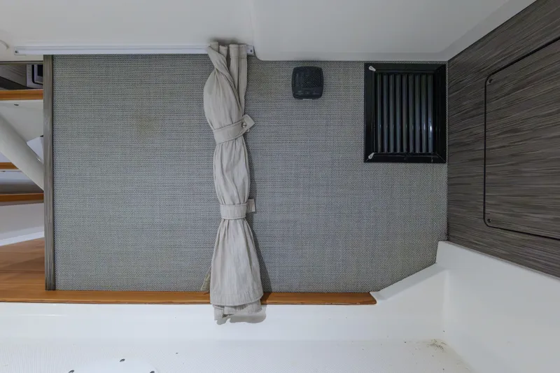 Slide: The Image of Interior view of 2020 Tiara Yachts 43 LS, featuring carpet and vent details. - 57