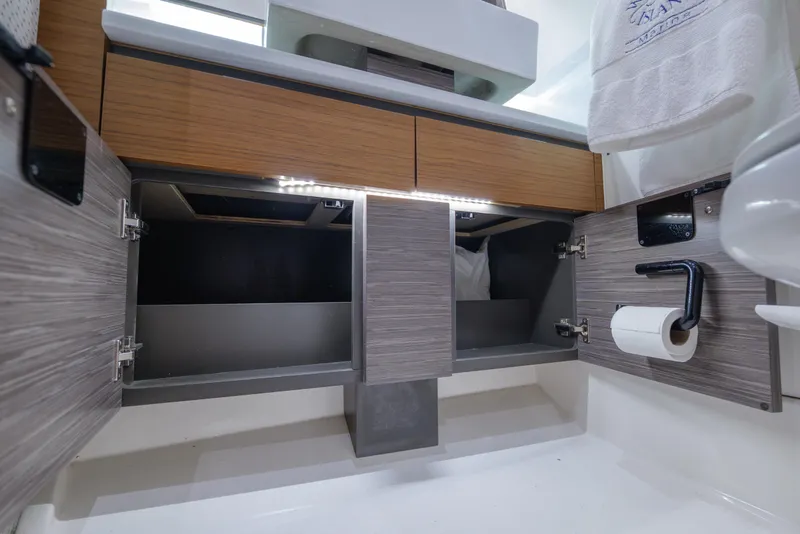 Slide: The Image of Modern bathroom cabinet in 2020 Tiara Yachts 43 LS, featuring open storage and sleek design. - 60