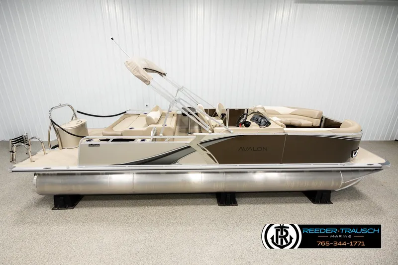 The Image of 2026 Avalon LSZ ENT pontoon boat in showroom, side view. - 1