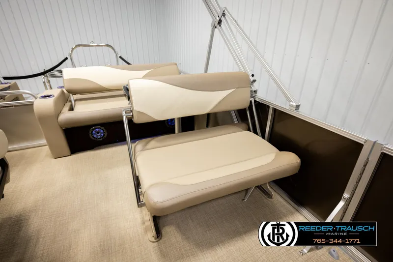 Slide: The Image of 2026 Avalon LSZ ENT boat interior with beige seating and modern design. - 25