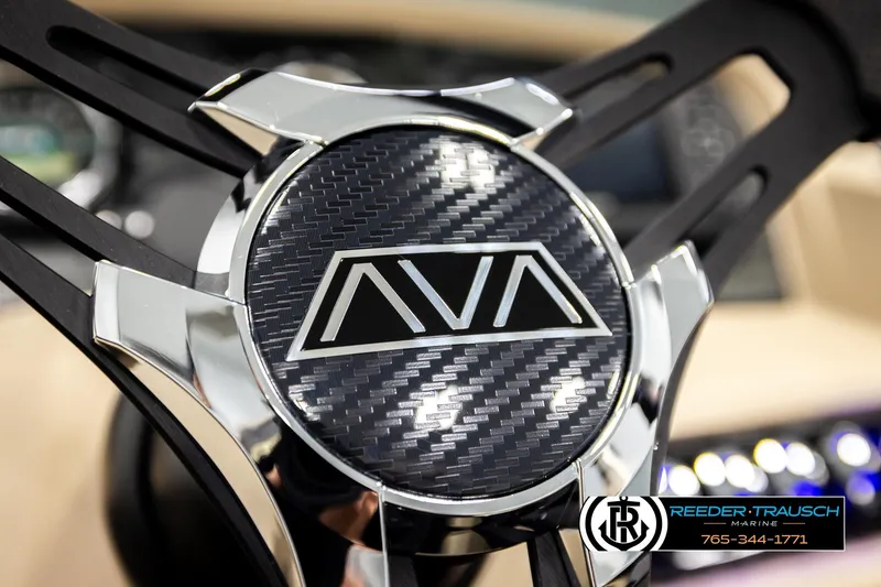 Slide: The Image of Steering wheel of 2026 Avalon LSZ ENT with carbon fiber design and chrome accents. - 36