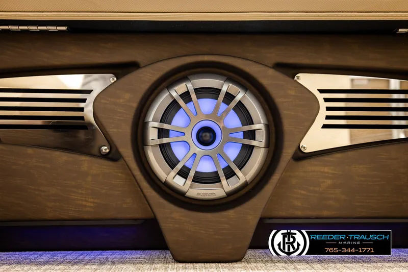 Slide: The Image of 2026 Avalon LSZ ENT speaker with blue LED lighting, Reeder-Trausch Marine branding. - 48