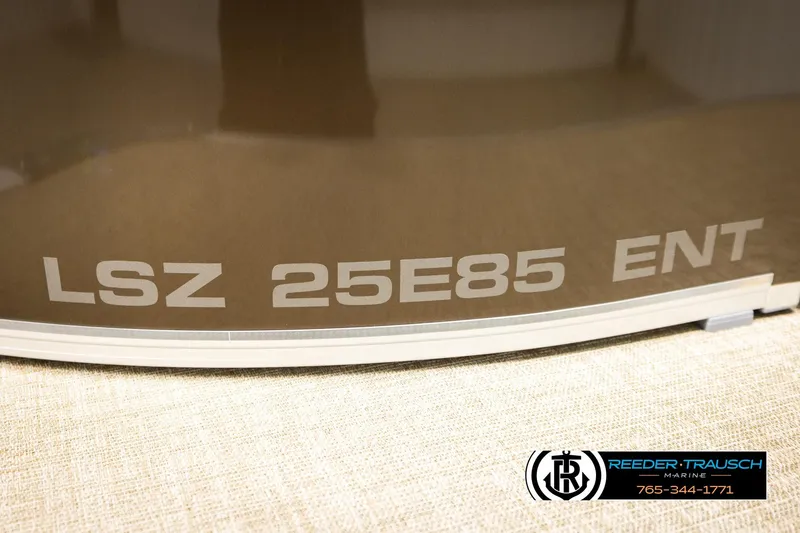 Slide: The Image of 2026 Avalon LSZ ENT boat model with Reeder-Trausch Marine branding. - 53