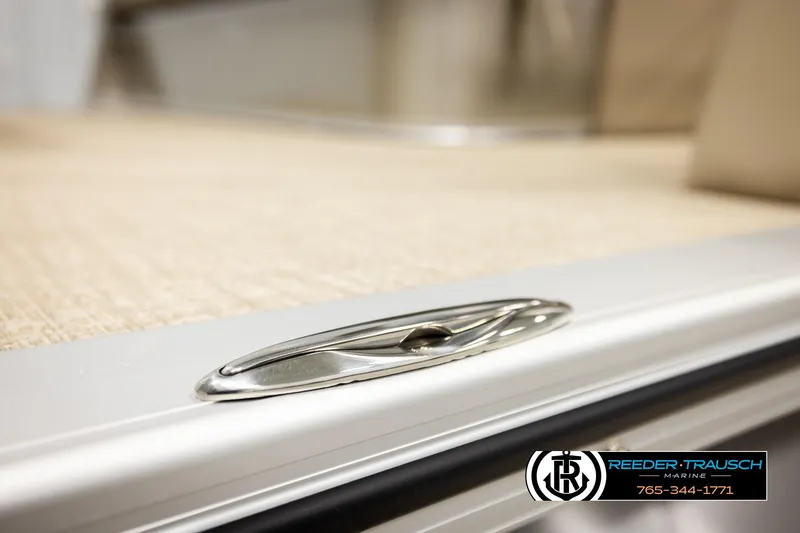 Slide: The Image of 2026 Avalon LSZ ENT boat detail with sleek metal cleat and textured flooring. - 56