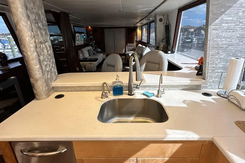 Slide: The Image of 1988 Viking Motor Yacht kitchen with sink, faucet, and modern interior. - 33