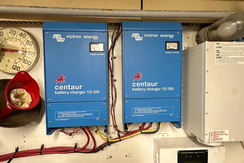 Slide: The Image of Victron Energy Centaur battery chargers on a 1988 Viking Motor Yacht. - 37