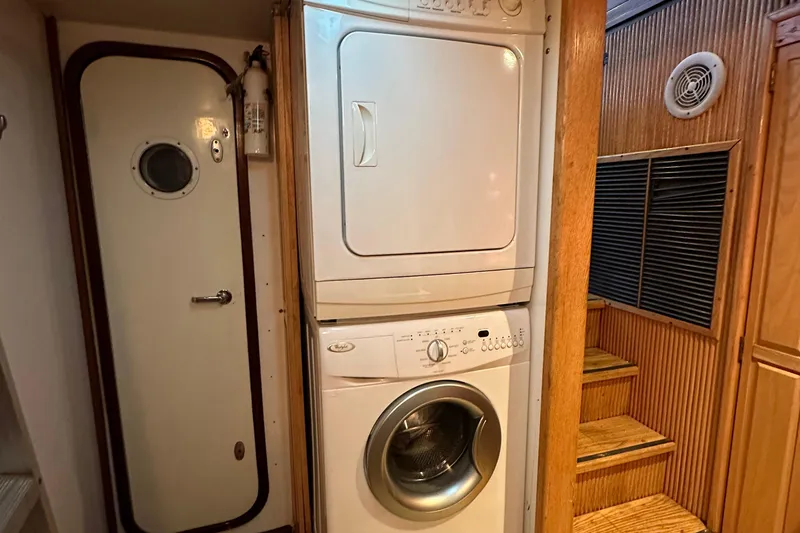 Slide: The Image of Stacked washer and dryer in 1988 Viking Motor Yacht laundry area. - 39