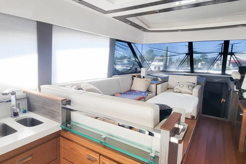 Slide: The Image of Luxurious interior of 2020 Tiara Yachts C53 Coupe with modern seating and sleek design. - 19