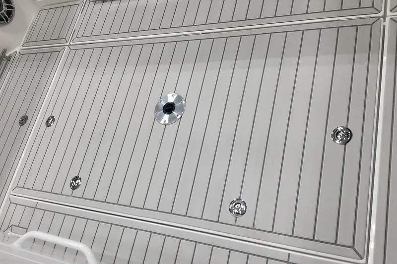 Slide: The Image of 2024 Formula 387 Center Console Fish deck with sleek, modern design and chrome fixtures. - 21
