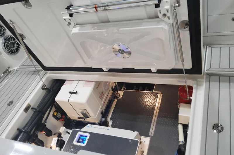 Slide: The Image of 2024 Formula 387 Center Console Fish engine compartment with advanced equipment and sleek design. - 22