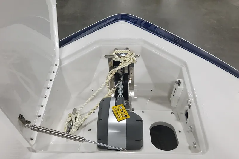 Slide: The Image of 2024 Formula 387 Center Console Fish anchor compartment with ropes and winch system. - 45