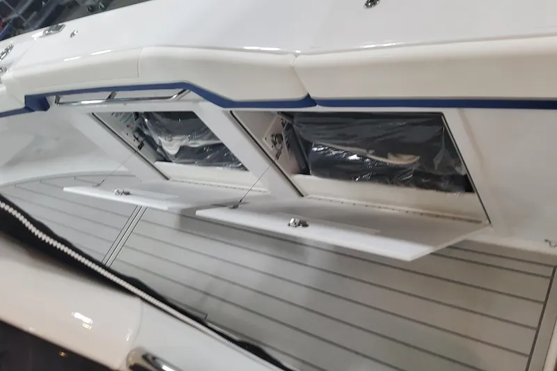 Slide: The Image of 2024 Formula 387 Center Console Fish boat storage compartments, open and ready for use. - 50