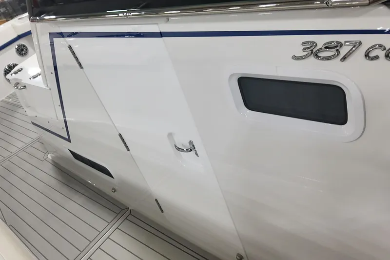 Slide: The Image of 2024 Formula 387 Center Console Fish boat, sleek white exterior with modern design elements. - 51