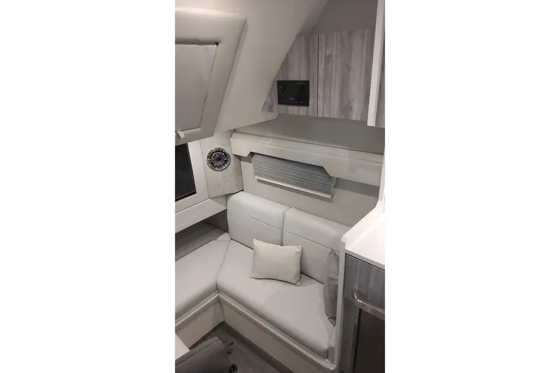 Slide: The Image of 2024 Formula 387 Center Console Fish cabin interior with modern seating and cabinetry. - 53