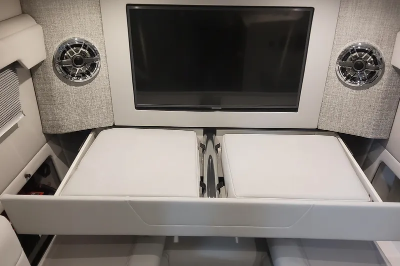 Slide: The Image of 2024 Formula 387 Center Console Fish interior with TV and speakers. - 56