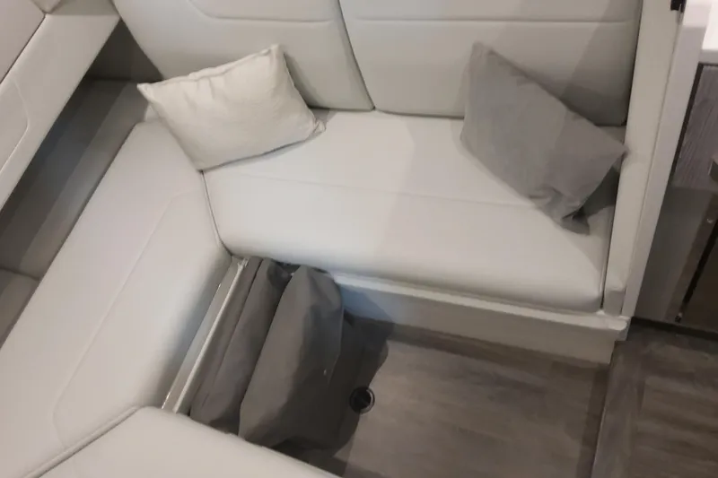 Slide: The Image of 2024 Formula 387 Center Console Fish interior seating with cushions, showcasing modern design. - 64