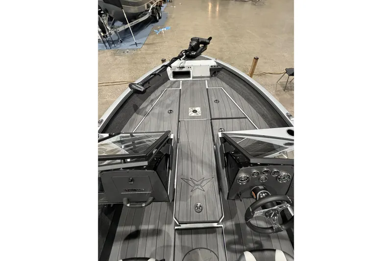Slide: The Image of 2026 Vexus ADX 190 boat interior with sleek design and modern dashboard. - 8