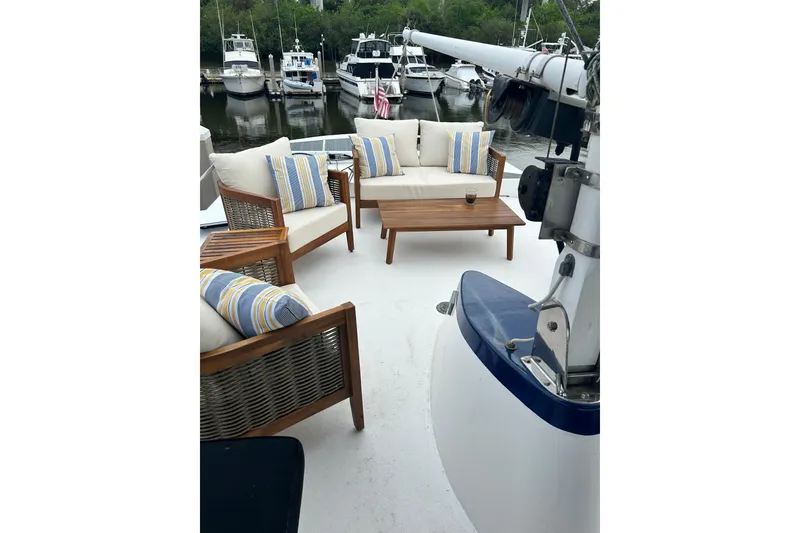 Slide: The Image of 1979 Cheoy Lee 46 LRC yacht bathroom with sink, mirror, and toilet. - 12