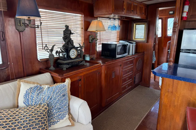 Slide: The Image of Interior of 1979 Cheoy Lee 46 LRC yacht with wooden cabinetry and nautical decor. - 23