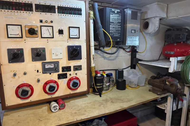 Slide: The Image of Electrical control panel in a 1979 Cheoy Lee 46 LRC yacht engine room. - 46