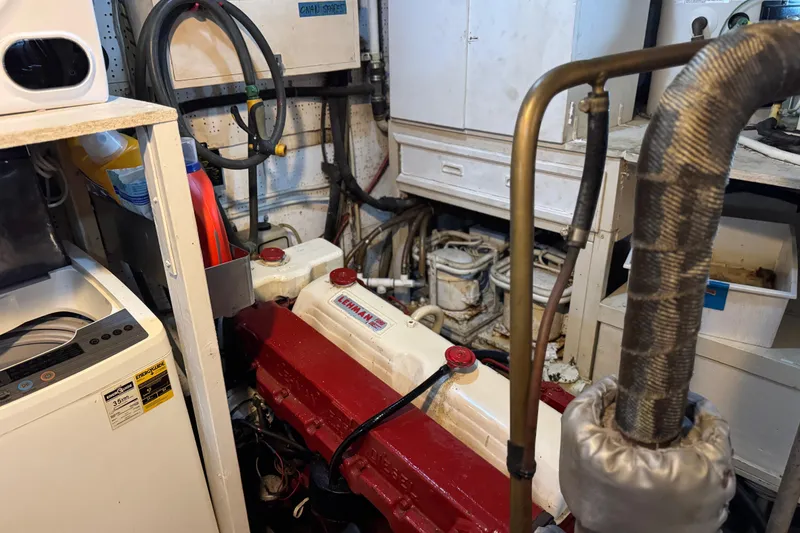 Slide: The Image of Engine room of 1979 Cheoy Lee 46 LRC with Lehman engine and equipment. - 47