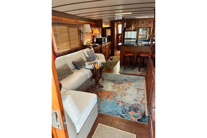 Slide: The Image of 1979 Cheoy Lee 46 LRC yacht bathroom with sink, toilet, and wooden cabinetry. - 7