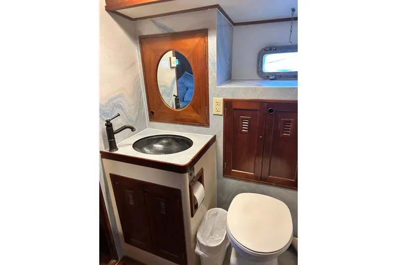 Slide: The Image of Luxurious 1979 Cheoy Lee 46 LRC yacht interior with elegant decor and large windows. - 8