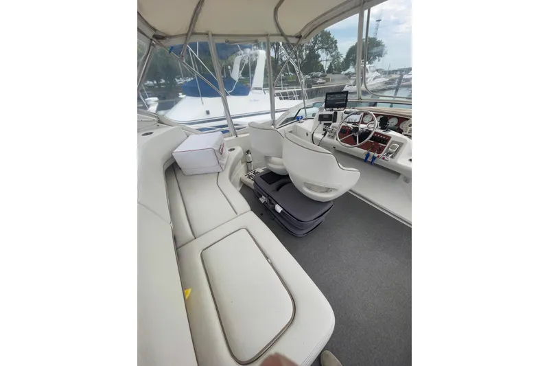 Slide: The Image of 2006 Silverton 35 Motor Yacht interior with spacious seating and modern design. - 18