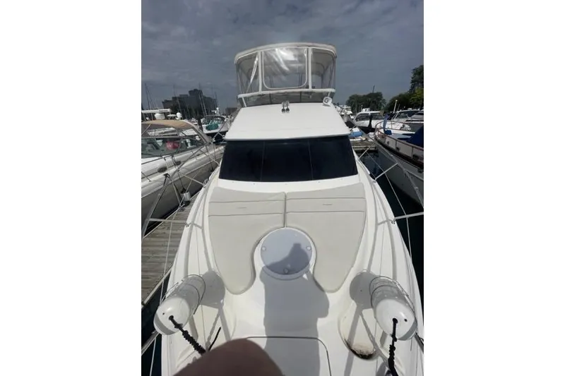 Slide: The Image of Luxurious bathroom in 2006 Silverton 35 Motor Yacht with wood cabinetry and modern fixtures. - 19