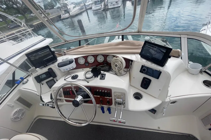 Slide: The Image of Luxurious interior of a 2006 Silverton 35 Motor Yacht with plush seating and modern amenities. - 3