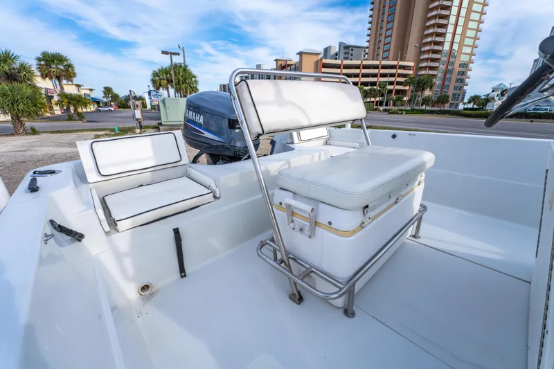 Slide: The Image of 2002 ProMaster 190 BAY boat with Yamaha 115 outboard motor on a trailer. - 13