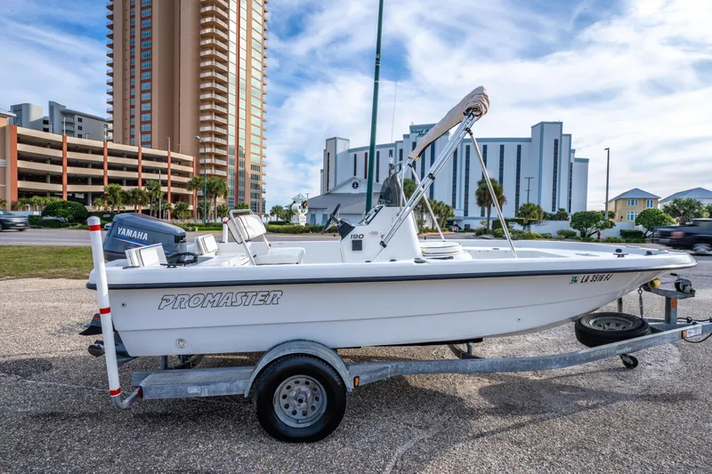 Slide: The Image of Orange Beach boat sales offer inspections, financing, and accessories. Pro Master 190 BAY 2002 featured. - 4