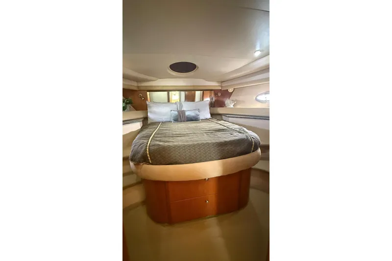 Slide: The Image of Luxurious bedroom interior of 2004 Meridian 459 Motoryacht with elegant bedding. - 11