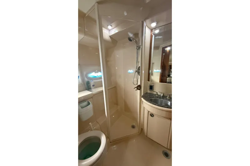 Slide: The Image of Bathroom interior of 2004 Meridian 459 Motoryacht with shower and sink. - 13