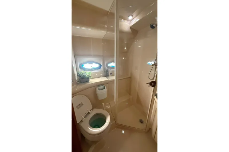Slide: The Image of Bathroom interior of 2004 Meridian 459 Motoryacht with shower and toilet. - 14